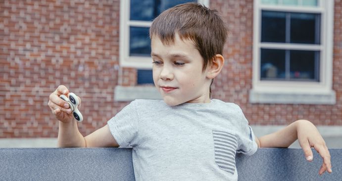 boy with Fidget Spinner