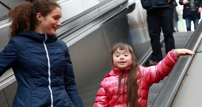 autistic girl on escalator